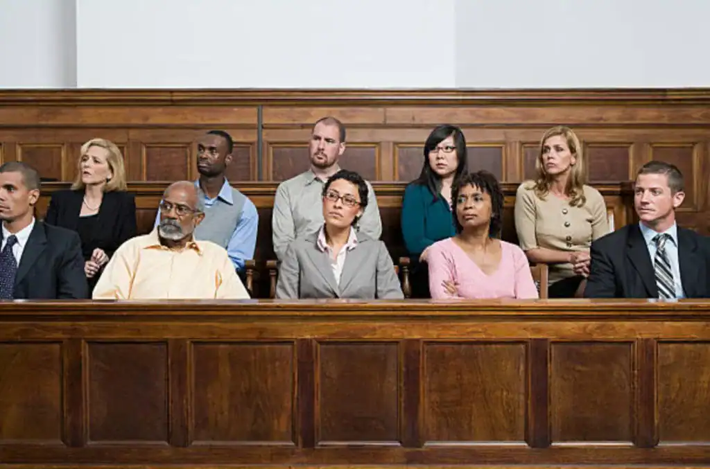 A jury viewing the evidence during a trial presentation.